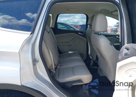 2017 Ford Escape Titanium z USA, uszkodzony, nr VIN 1FMCU9J93HUE43374